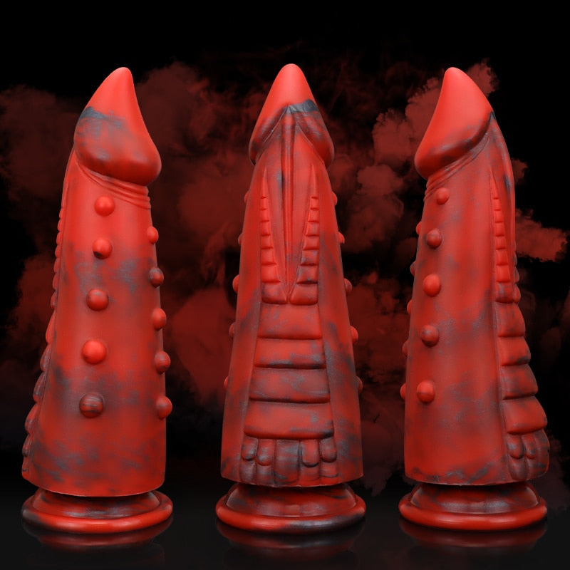 Roter und schwarzer Monsterdildo