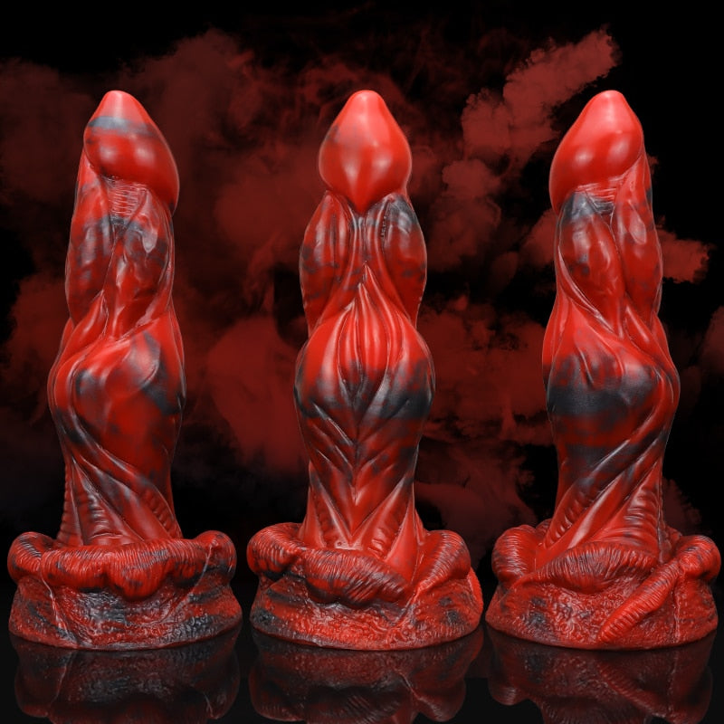 Roter und schwarzer Monsterdildo