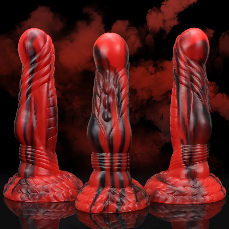 Roter und schwarzer Monsterdildo